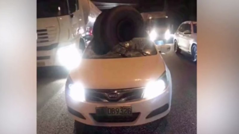 Watch As a Runaway Truck Wheel Demolishes an Oncoming Car