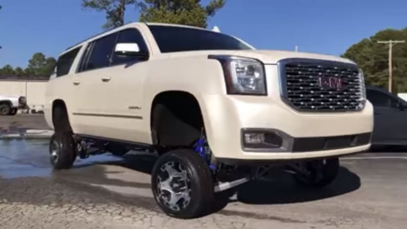 Watch a GMC Yukon Bro-Dozer on Tiny Wheels Do a Gigantic Burnout