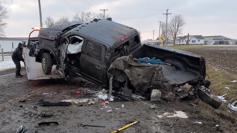 Driver Crashes Into Culvert, Barrel Rolls, Clears 7-Foot Road Sign, Turns Ram Into Mangled Mess