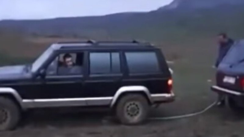 Off-Roader Escapes Decapitation After Strap Snaps and Tow Hook Flies Through Windshield