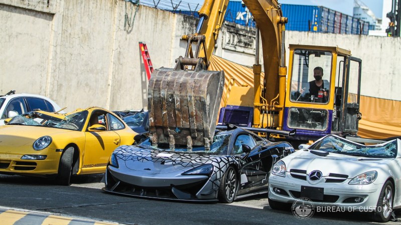 Watch Customs Officials Crush a Contraband McLaren 620R