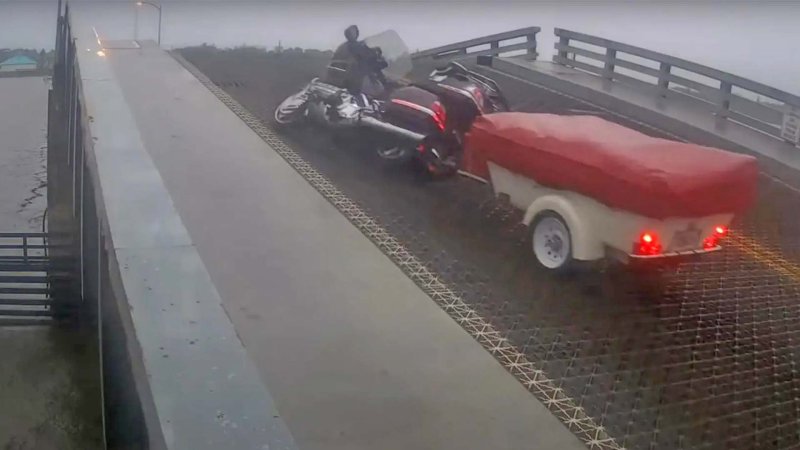 Biker Nearly Flies Off Raised Drawbridge After Smashing Through Gate