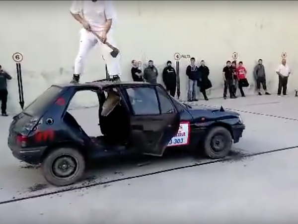 You Won’t Believe How Fast This Guy Chops a Car in Half with an Axe