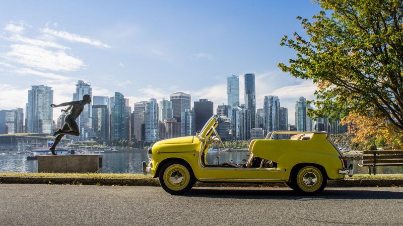 Laughing Around Town in a Fiat Jolly