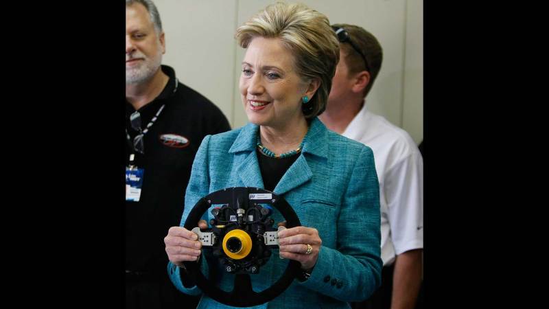 Please, Look at Hillary Clinton Pretending to Drive an IndyCar